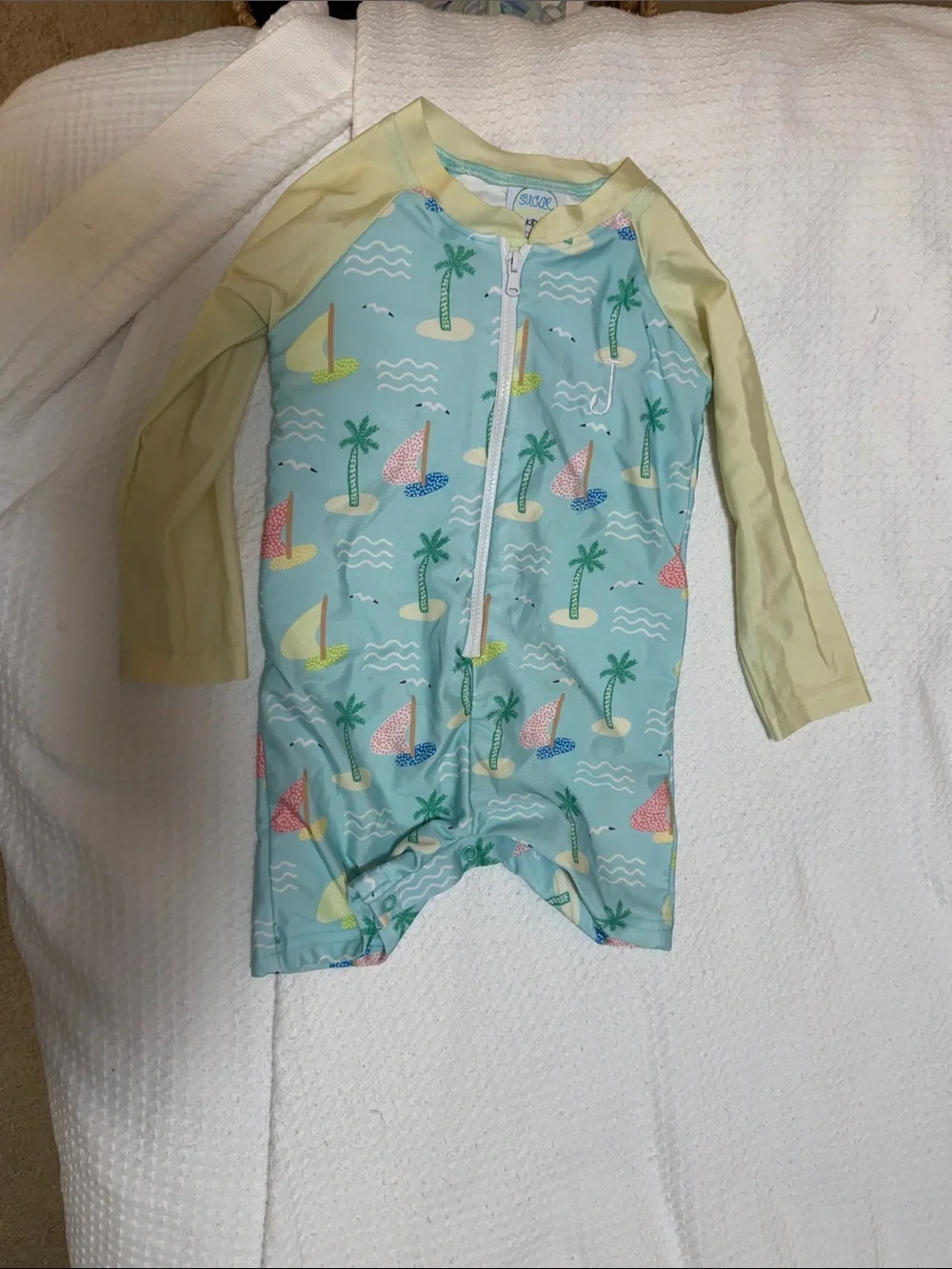 Kids Long-Sleeve One-Piece Swimsuit in Light Blue and Yellow with “J” initial